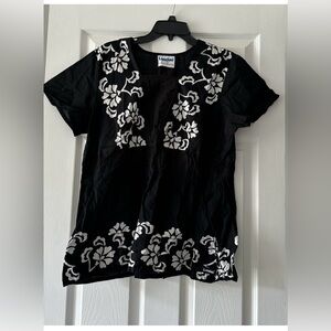 Landau short-sleeve top is a size Medium.